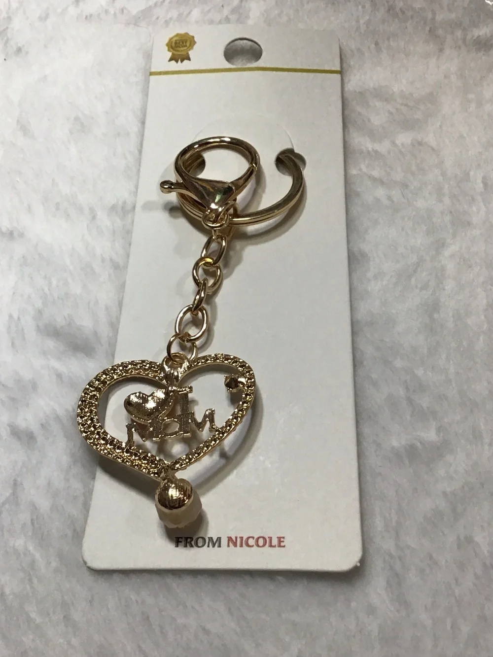 Nicole Gold-Tone Heart Keychain with Red Heart Accent